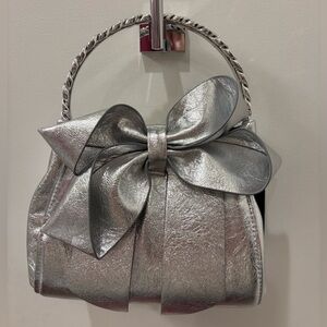 NWT House of Harlow 1960 soft Silver Bow Clutch